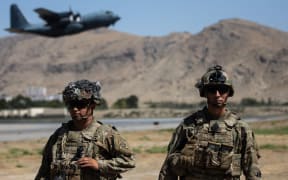 U.S soldiers from the XVIII Airborne Corps in  position guarding the at Hamid Karzai International Airport in Kabul, Afghanistan, on Aug 27, 2021.