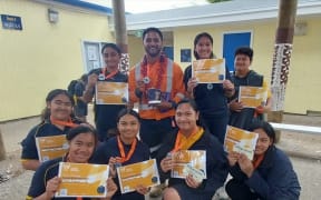Watercare engineer Lukan Paitai Tuiatua, pictured here with students from Clendon Park School's Tautua Mo Tupulaga Samoan language unit, says he was blown away by the ingenuity and hard work of the winning team in the Power Challenge Competition.