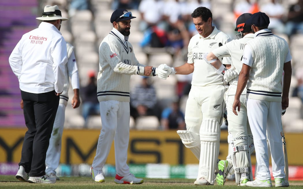 India captain Virat Kohli shakes hands with Black Caps batsman Ross Taylor after Taylor had been hit on the head by a delivery on day 6 of the ICC World Test Championship Final at Southampton, England on Thursday 23rd June 2021.