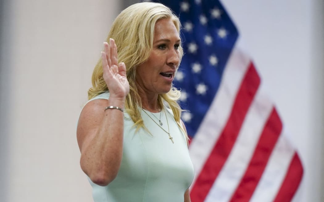 Rep. Marjorie Taylor Greene prepares to testify, on April 22, 2022 in Atlanta, Georgia.