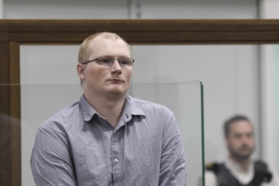 Paddy Jonathan Woods listens to Justice David Collin's decision