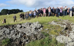 'Save Our Unique Landscape' supporters on Soiuth Auckland's Ihumātao Peninsula