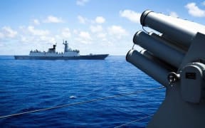 Crew members of China's South Sea Fleet take part in a logistics supply drill near the James Shoal area on South China Sea.