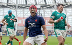 France's wing Louis Bielle-Biarrey celebrates after scoring the opening try of the Six Nations match against Ireland.