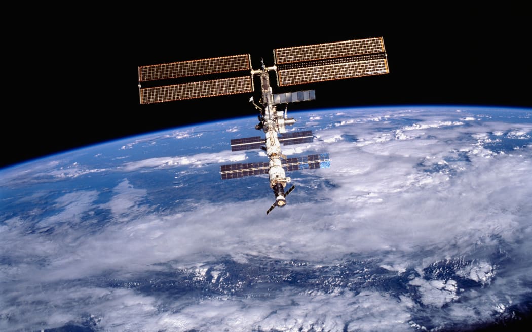 International Space Station (ISS), photographed from the Shuttle Orbiter Discovery.