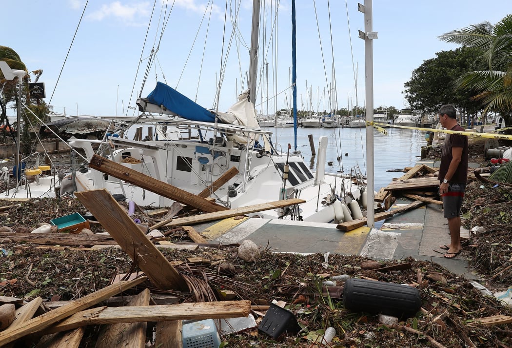 A damaged boat is seen at the Dinner Key marina after Hurricane Irma passed through the area on September 11, 2017 in Miami, Florida.