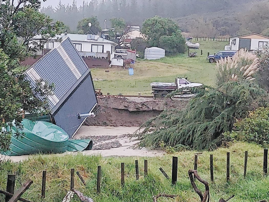 A house falls over at Waipiro Bay, about 100km north of Gisborne.