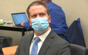 Former Minneapolis police officer Derek Chauvin listens to the verdict.