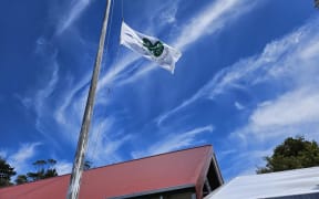 The flag of Kōhanga Reo at half mast.