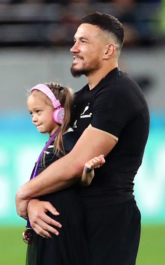 Sonny Bill Williams with his daughter Imaan after the loss to England.