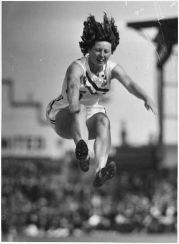 Yvette Williams long jumping at Carisbrook park, Dunedin