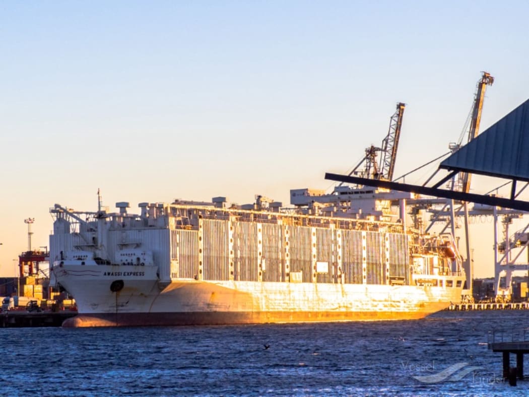 Awassi Express moored at a port.