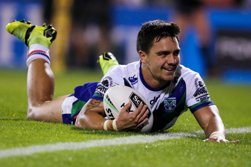 Kodi Nikorima scores for the Warriors during their win over the Penrith Panthers