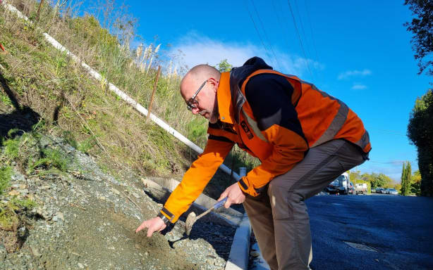 GNS Science engineering geologist Dr Chris Massey at the Tāhunanui slump, Nelson.