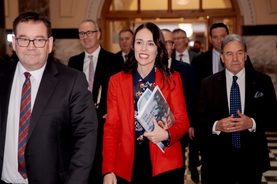 Finance Mrnister Grant Robertson and Prime Minister Jacinda Ardern arrive with Deputy Prime Minister Winston Peters in tow for the release of Budget 2019.