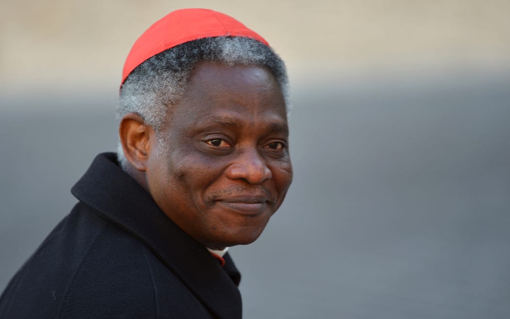 Ghanean cardinal Peter Kodwo Appiah Turkson arrives for talks ahead of a conclave to elect a new pope on March 4, 2013 at the Vatican.  The Vatican meetings will set the date for the start of the conclave this month and help identify candidates among the cardinals to be the next leader of the world's 1.2 billion Catholics.  AFP PHOTO / VINCENZO PINTO (Photo by Vincenzo PINTO / AFP)