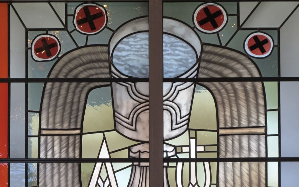 stained glass image of chalice