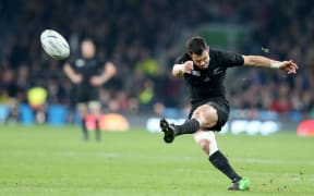 Dan Carter kicks a conversion during the Rugby World Cup final against Australia at Twickenham.