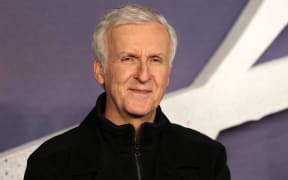 US film director James Cameron poses for photographers upon arrival to attend the world premiere of the film "Alita: Battle Angel" in London on January 31, 2019. (Photo by Daniel LEAL / AFP)