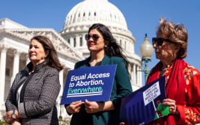Representatives Diana DeGette, Rashida Tlaib, and Jan Schakowsky, participate in a a press conference on abortion access at the US Capitol.