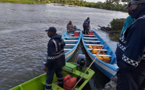 Police and Maritime Safety officers seize the boats at Nasali Landing in Rewa.