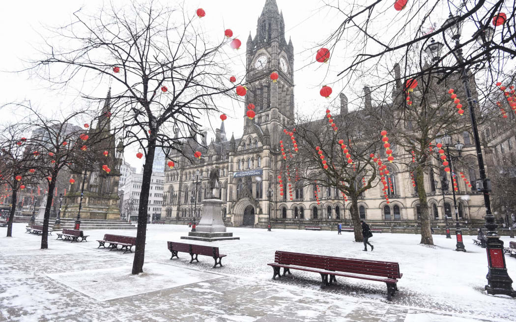 A snow covered Albert Square and Manchester Town Hall in Manchester city centre in the UK as Britain faces a wave of cold weather, nicknamed the 'beast from the east' in the British press as well as storm Emma - March 1, 2018.
