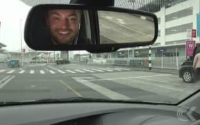 Alex Ashton driving to Auckland Airport