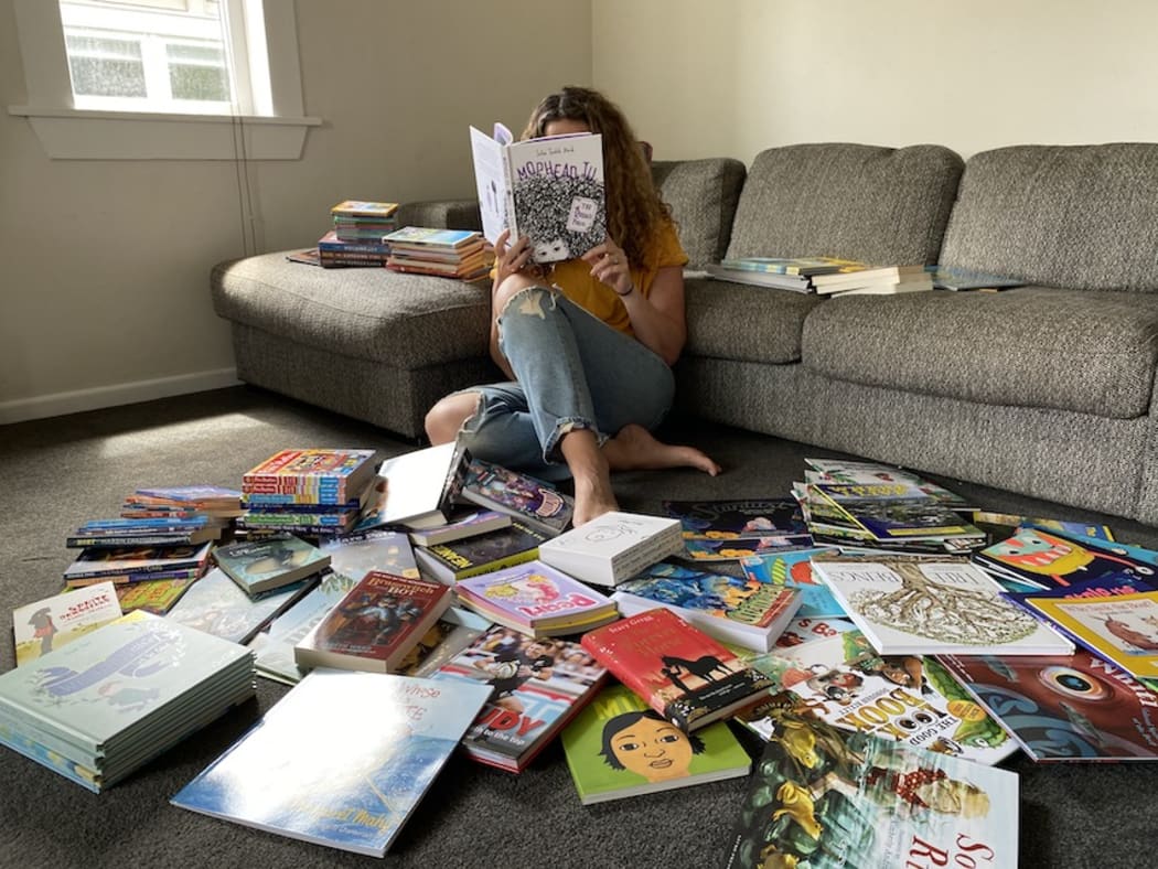 Sonya Wilson with some of previously donated books