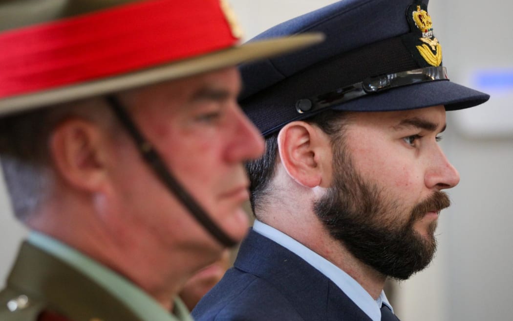 A private Anzac ceremony is held at the Hall of Memories at Pukeahu after a larger public ceremony was cancelled due to high winds.