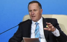 John Key speaking during the APEC CEO Summit in Beijing.