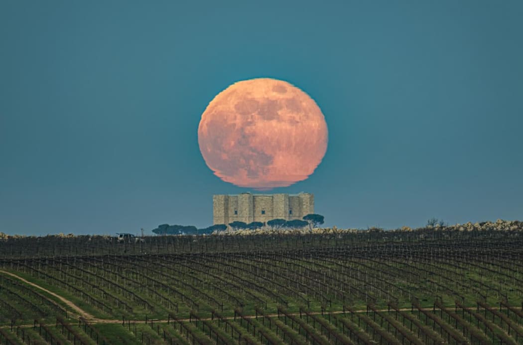 A Crown on the Castle by Donato Lioce is one of over 100 photographs on show at the National Maritime Museum in London as part of the Astronomy Photographer of the Year competition.