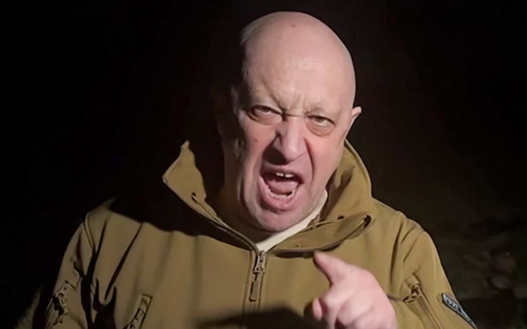 EDITORS NOTE: Graphic content / This video grab taken from a handout footage posted on May 5, 2023 on the Telegram account of the press-service of Concord -- a company linked to the chief of Russian mercenary group Wagner, Yevgeny Prigozhin -- shows Yevgeny Prigozhin addressing the Russian army's top brass standing in front of bodies he presented as fallen Wagner fighters at an undisclosed location. The head of Russian paramilitary group Wagner on Friday lashed out at Russian army chiefs with an expletive-laden rant in a video showing dozens of dead bodies. In the video on his Telegram channel, Yevgeny Prigozhin accused Defence Minister Sergei Shoigu and chief of staff Valery Gerasimov, of failing to provide his fighters with enough ammunition. (Photo by Handout / TELEGRAM/ @concordgroup_official / AFP) / RESTRICTED TO EDITORIAL USE - MANDATORY CREDIT "AFP PHOTO /  Telegram channel of...