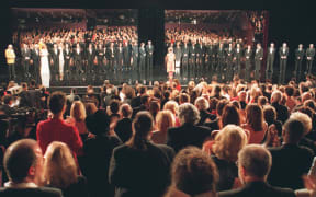 Standing ovation of the audience in front of former Golden Palms laureates on the stage of the festivals Palace 11 May during the Palm of the Golden Palms ceremony. The Cannes film festival was celebrating its 50th anniversary on Sunday.