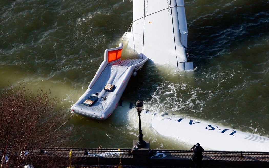 NEW YORK - JANUARY 16: The wreckage of US Airways flight 1549 floats in the Hudson River as investigations into the accident continue on January 16, 2009 near Battery Park City in New York City. Yesterday the pilot, Chesley "Sully" Sullenberger, 57, of the damaged plane landed the aircraft in the river with all 155 people aboard surviving.   Mario Tama/Getty Images/AFP (Photo by MARIO TAMA / GETTY IMAGES NORTH AMERICA / Getty Images via AFP)