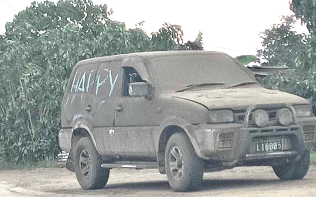 Volcanic ashes cover this car in Pili, Tongatapu on 16 January 2022.