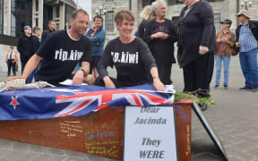 Julian and Camilla Cox cycled from Dunedin to Wellington. Pictured outside Parliament.