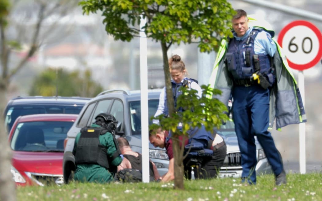 Police have taken a man into custody after an officer was shot in Auckland's Flat Bush.
NOTE: use blurred version of this unless supression lifts