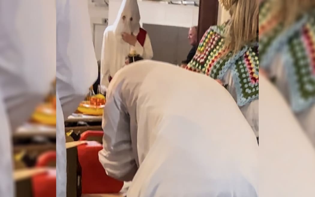 Quiz contestants at the Kaimai Settlers Committee fundraiser 19 August 2023 dressed as Ku Klux Klan KKK complete with petrol can
picture supplied