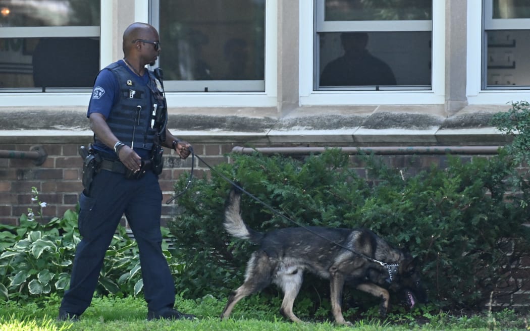 Motive probed for US shooting that killed two children injured 17