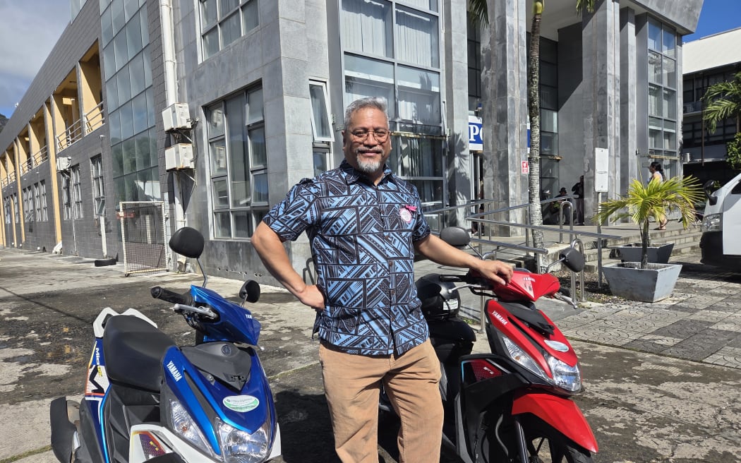 New Zealand Green MP and Cook Islander Teanau Tuiono in Rarotonga, collecting his scooter license