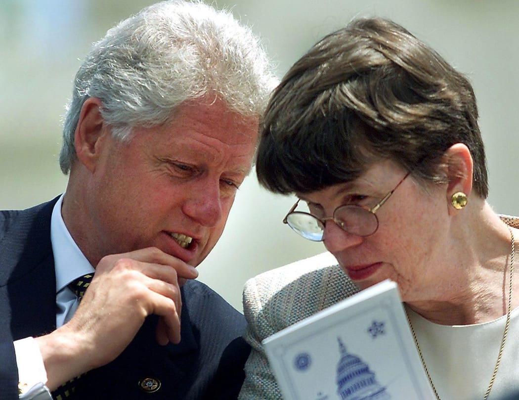 US President Bill Clinton talks with US Attorney General Janet Reno May, 2000, in Washington, DC.