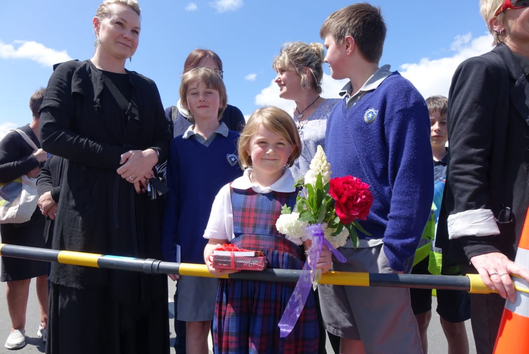 Five-year-old Saffron Chisholm, from St Mary's School in Mosgiel, presented the royal couple with a bouquet of flowers, a crossword book and a box of chocolates.