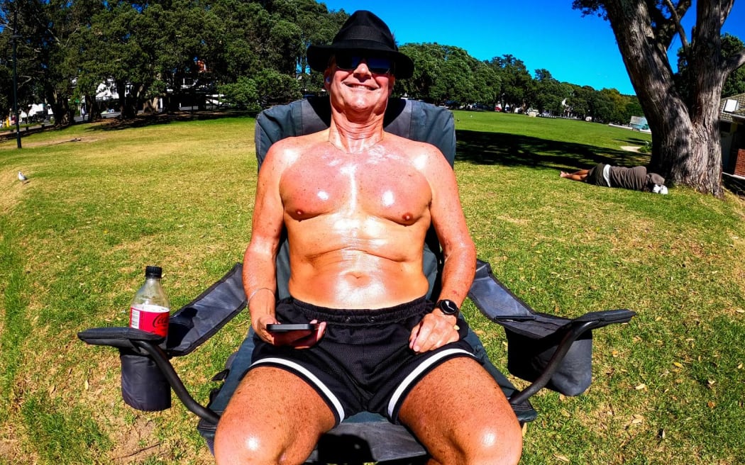 A beachgoer at Mission Bay, who says he's at the beach every day it's sunny and goes through a third of a 175g sunscreen aerosol each time.