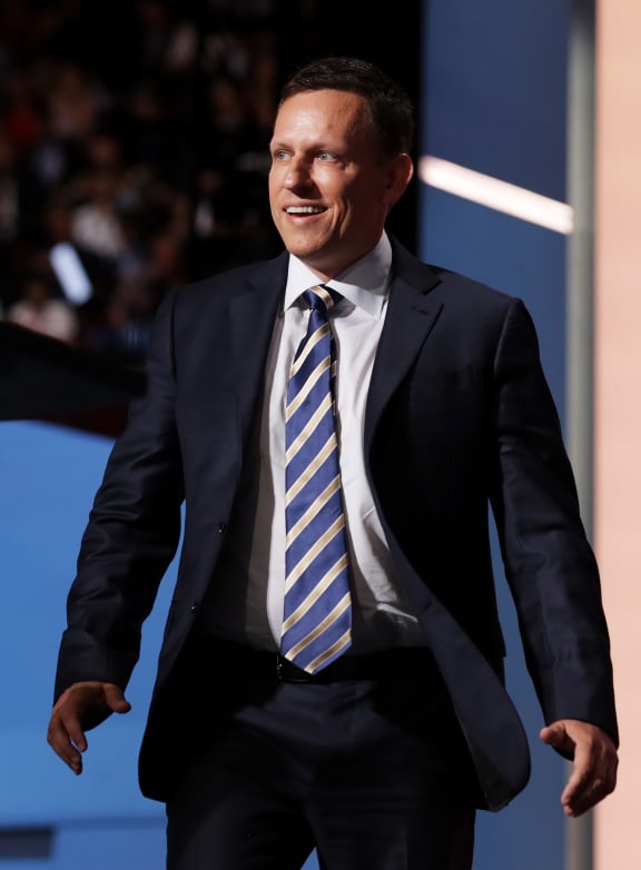Peter Thiel, co-founder of PayPal, walks on stage to deliver a speech during the evening session on the fourth day of the Republican National Convention on July 21, 2016 at the Quicken Loans Arena in Cleveland, Ohio.