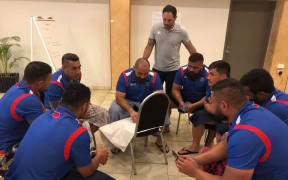 Pacific Rugby Players CEO Aayden Clarke (c) with members of the Manu Samoa team.