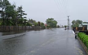 Derby Street in Westport has been flooded after heavy rainfall as residents evacuate the area.