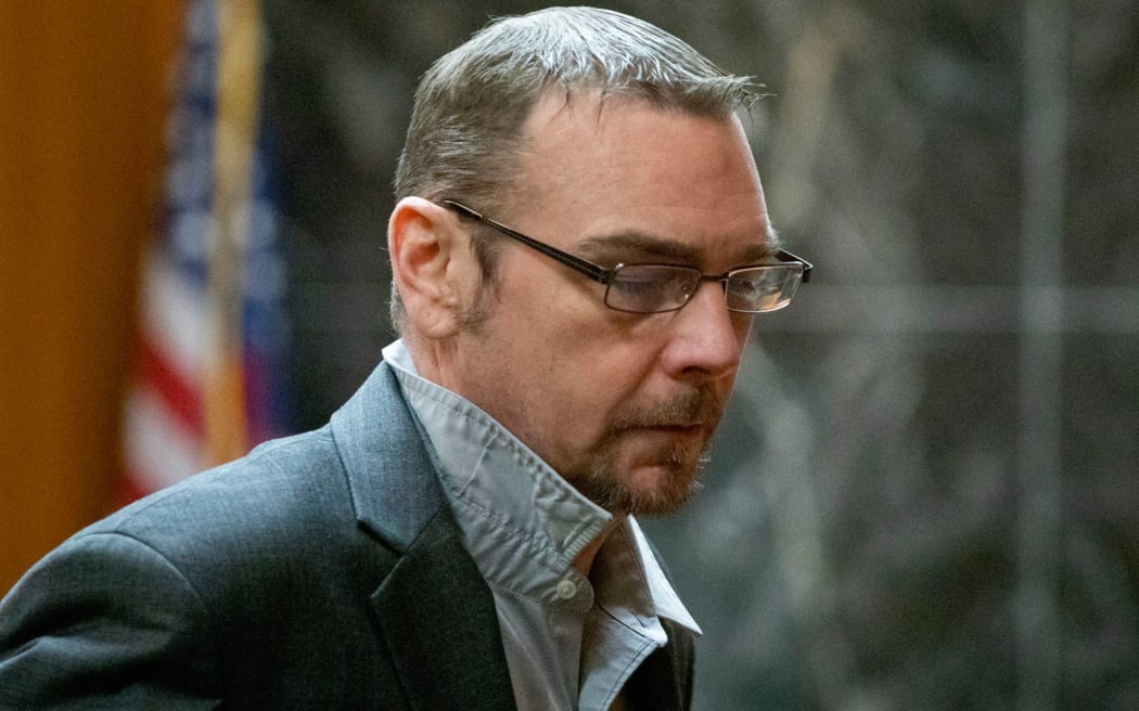 PONTIAC, MICHIGAN - MARCH 13: James Crumbley, father of Oxford High School school shooter Ethan Crumbley, exits the courtroom for the day after the jury decided to resume deliberations tomorrow during his trial on four counts of involuntary manslaughter for the deaths of four Oxford High School students who were shot and killed by his son, on March 13, 2024 at Oakland County Circuit Court in Pontiac, Michigan. Crumbley's wife Jennifer Crumbley was convicted on the same four counts at her trial last month, the first time in U.S. history that a parent was tried in relation to a mass school shooting that was committed by their child. Photo by Bill Pugliano/Getty Images) (Photo by BILL PUGLIANO / GETTY IMAGES NORTH AMERICA / Getty Images via AFP)