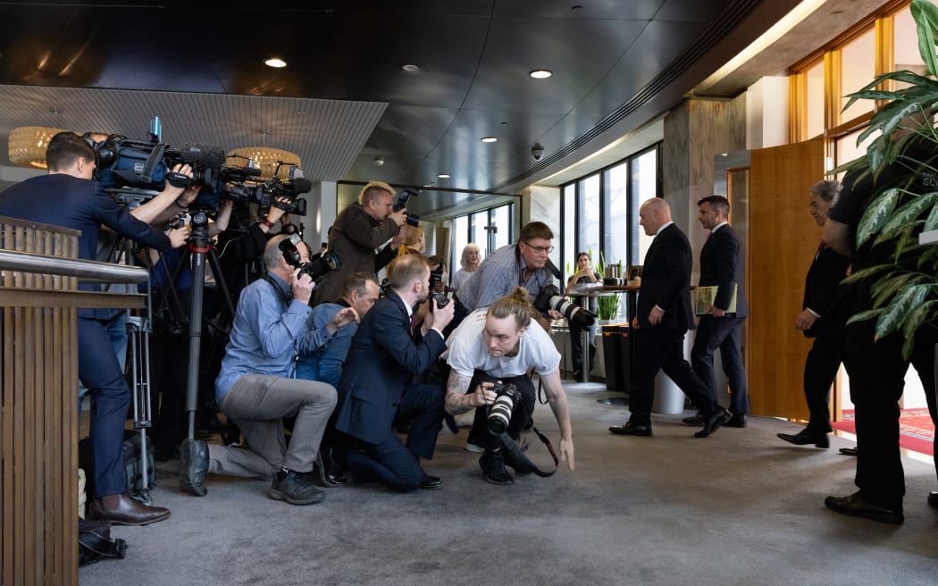 Coalition agreement signing ceremony between Christopher Luxon, David Seymour and Winston Peters.