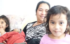 Angua Erika and her 3 children.