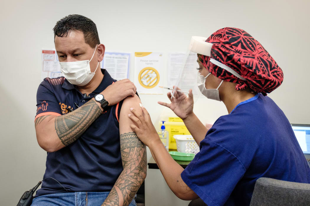 Drew Leafa, one of Auckland's Jet Park Hotel quarantine facility workers being vaccinated against Covid-19 on 20 February 2021.